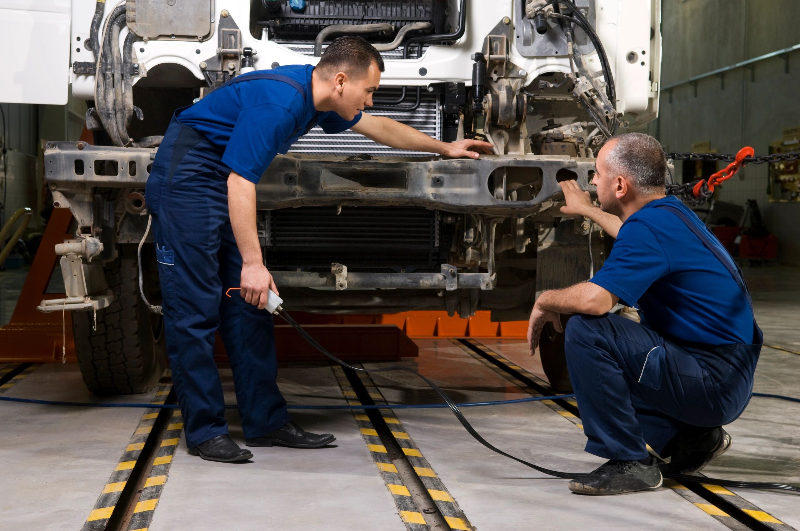 truck repair team at work
